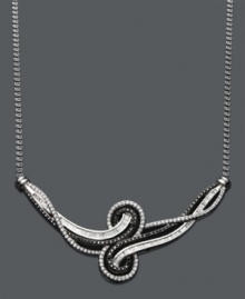 The perfect complement to your little black dress. This Wrapped in Love™ necklace defines elegance with round-cut black diamonds (1/3 ct. t.w.) and round and baguette-cut white diamonds (5/8 ct. t.w.) set in sterling silver. Approximate length: 15 inches. The perfect complement to your little black dress. This Wrapped in Love™ necklace defines elegance with round-cut black diamonds (1/3 ct. t.w.) and round and baguette-cut white diamonds (5/8 ct. t.w.) set in sterling silver. Approximate length: 15 inches.