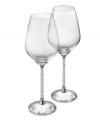 Add a touch of brilliant sparkle to your entertaining style with this set of white wine glasses. Shown at left. The bowls' classic lines and stems filled with glimmering Swarovski crystals combine for a sophisticated sensibility. Each measures 8-1/3 H x 2-7/8 D.