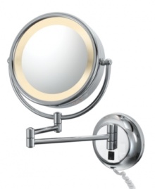 Within reach. Featuring an adjustable arm and two-sided mirror with lighted rim, this wall mirror makes sure you look your best while keeping your bath neat and organized. Tilts for viewing. Within reach. Featuring an adjustable arm and two-sided mirror with lighted rim, this wall mirror makes sure you look your best while keeping your bath neat and organized. Tilts for viewing.