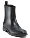 Boasting an of-the-moment abbreviated silhouette, these slick Salvatore Ferragamo boots prove rain can't stop sharp Italian style.