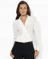 Lauren Ralph Lauren's soft silk wrap blouse is modernized for the season with dolman sleeves.