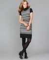 A sweater dress in Fair Isle knit is just right - try this cozy version from Tommy Hilfiger, in modern black and white.