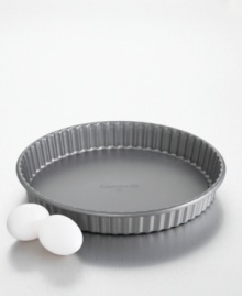 Whip up a tantalizing tart in this specialty pan from Calphalon. It features a reinforced nonstick coating inside and out and convenient removable bottom plate, making both baking and food removal easier than ever. Lifetime warranty. Whip up a tantalizing tart in this specialty pan from Calphalon. It features a reinforced nonstick coating inside and out and convenient removable bottom plate, making both baking and food removal easier than ever. Lifetime warranty.