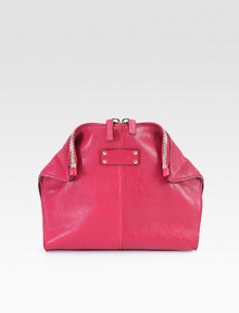 Luxurious leather with seamed details and chic fold-down corners; perfect for all your favorite cosmetics.Top zip closure with magnetic fold-down cornersFully lined7¾W X 7H X 2½DMade in Italy