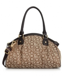 Signature jacquard and gleaming goldtone hardware lend a luxe look to this chic satchel from Calvin Klein. Its spacious interior offers plenty of room to stow wallet, phone, makeup case and any other little essentials you can't leave home without. Signature jacquard and gleaming goldtone hardware lend a luxe look to this chic satchel from Calvin Klein. Its spacious interior offers plenty of room to stow wallet, phone, makeup case and any other little essentials you can't leave home without.