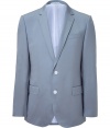 Elegant jacket in fine, pale grey linen and cotton blend - Soft, lighter weight material drapes beautifully - Single-breasted style with two-button closure and deep, narrow-cut lapels - Chest pocket and flap pockets at sides - Slim, slightly longer cut through the torso - Polished and classically cool, seamlessly transitions from day to evening - Pair with a button down or t-shirt and trousers or chinos