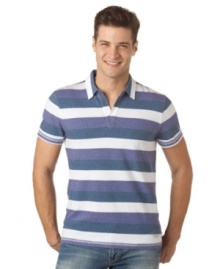 With a crisp, nautical-inspired stripe, this Calvin Klein polo shirt is a warm-weather must-have. With a crisp, nautical-inspired stripe, this Calvin Klein polo shirt is a warm-weather must-have.