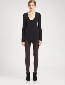 From the HELMUT capsule collection. Edgy elegance in its truest form, this modal-rich top has a plunging scoopneck and shirttail hem that hits below the hips. ScoopneckLong sleevesShirttail hem hits below the hipsAbout 27 from shoulder to hem at longest pointModal/wool/spandexDry cleanMade in USA of Canadian fabricModel shown is 5'9 (176cm) wearing US size Small.