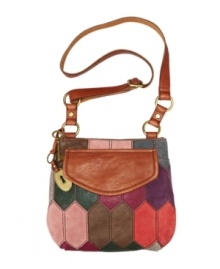 Another entry in Fossil's fabulous Modern Cargo line, this flap purse brings a boho-chic vibe to the on-the-go crossbody style. Another entry in Fossil's fabulous Modern Cargo line, this flap purse brings a boho-chic vibe to the on-the-go crossbody style.
