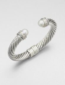 From the Pearl Crossover Collection. An iconic sterling silver cable accented with diamond and pearl end caps. Cultured pearlsDiamonds, .24 ctw Sterling silverDiameter, about 2.25Slip-on styleImported From the Pearl Crossover Collection. An iconic sterling silver cable accented with diamond and pearl end caps. Cultured pearlsDiamonds, .24 ctw Sterling silverDiameter, about 2.25Slip-on styleImported