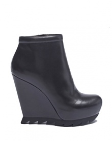 Camilla Skovgaard's signature saw sole makes an edgy appearance on an ankle bootie in luxe nappa leather. Camilla Skovgaard's signature saw sole makes an edgy appearance on an ankle bootie in luxe nappa leather.