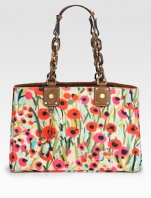 Lush florals highlight this roomy canvas carryall, finished with signature leather and chain-link straps for a one-of-a-kind look.Shoulder straps, 10½ dropProtective metal feetOne inside zip pocketTwo inside open pocketsCotton lining15½W X 10H X 8½DImported Lush florals highlight this roomy canvas carryall, finished with signature leather and chain-link straps for a one-of-a-kind look.Shoulder straps, 10½ dropProtective metal feetOne inside zip pocketTwo inside open pocketsCotton lining15½W X 10H X 8½DImported
