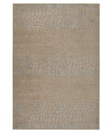 A refined reptilian pattern makes a stylish statement, suffusing your space with a touch of the exotic. Designed for easy care and long-lasting wear, this striking area rug from Surya will maintain its plush texture even in high-traffic areas.