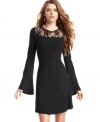 Featuring a lace accent and back-baring design, this bell sleeve dress from Jessica Simpson makes the most striking entrance.