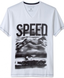Get up to speed this season: Calvin Klein Jeans' T-shirt with cheetah and sports car graphic. Get up to speed this season: Calvin Klein Jeans' T-shirt with cheetah and sports car graphic.