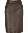 Luxe skirt in ultra-supple, dark brown leather - A sexy standout from cult luxury label Jitrois - Classic, feminine pencil cut - Elegant, on-trend dart detail at hips - Fitted and flattering, with a higher waist and back zip - Hits just above the knee - A refined, versatile staple that works for day or evening - Pair with a blazer and a button down, or dress up with a silk top and sandals