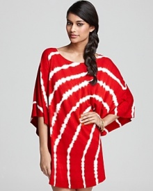 Take a walk on the wild side in Lucky Brand's Wild Child poncho, a dolman-sleeved silhouette in a vibrant tie-dye print. Take a walk on the wild side in Lucky Brand's Wild Child poncho, a dolman-sleeved silhouette in a vibrant tie-dye print.