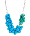 Simply bubblelicious. Haskell's playful style features bold blue and green acrylic beads with a striped bead accent. Set in silver tone mixed metal. Approximate length: 17 inches + 3-inch extender. Approximate drop: 1-1/4 inches.