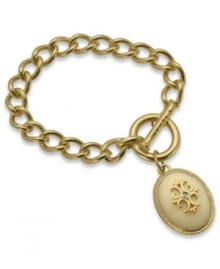 Endlessly romantic. T Tahari's heirloom-inspired charm bracelet features an oval pendant with ivory resin and cabochon beads. Crafted in 14K gold-plated mixed metal. Nickel-free for sensitive skin. Approximate length: 7-1/2 inches + 1-inch extender.