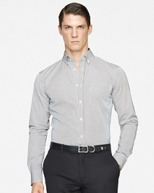 Rendered in smooth woven cotton for luxe comfort, a handsomely striped sport shirt is tailored for a trim, modern fit. Rendered in smooth woven cotton for luxe comfort, a handsomely striped sport shirt is tailored for a trim, modern fit.