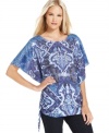 Dolman sleeves, a bold print and a ruched drawstring at the side give this Style&co. top fashionable flair.