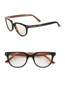 A sophisticated set of acetate frames with clear, easily replaced lenses. Wear the glasses as a simple accessory or replace the lenses with your own prescription. Replaceable optical lenses include permanent logo accent Metal T temple detail Made in Italy A sophisticated set of acetate frames with clear, easily replaced lenses. Wear the glasses as a simple accessory or replace the lenses with your own prescription. Replaceable optical lenses include permanent logo accent Metal T temple detail Made in Italy