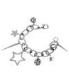 Shine on, rockstar! GUESS's star-studded charm bracelet features solid and cut-out stars, as well as crystal fireballs and spikes. Set in silver tone mixed metal with a lobster claw clasp. Approximate length: 7-1/2 inches.
