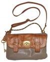 A vintage-inspired flap bag by Fossil with perfectly polished accents. Buckle detailing, a classic turnlock closure and goldtone hardware will make this design the star of any ensemble.