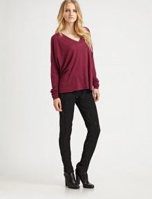 A slouchy essential crafted from a featherweight cotton jersey blend.V necklineDropped shouldersDolman sleevesPullover styleAbout 26 from shoulder to hem75% polyester/25% cottonMachine washImportedModel shown is 5'9 (175cm) wearing US size Small. A slouchy essential crafted from a featherweight cotton jersey blend.V necklineDropped shouldersDolman sleevesPullover styleAbout 26 from shoulder to hem75% polyester/25% cottonMachine washImportedModel shown is 5'9 (175cm) wearing US size Small.