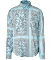 Stylish button down in fine, pure pale blue cotton - Classically cool, on-trend paisley motif - Small collar, chest pocket and long sleeves - Rounded hem hangs slightly longer in the back - Modern cut is slim and straight - Elegantly whimsical, ideal for the modern dandy - Pair with jeans, linen trousers, chinos or Bermuda shorts