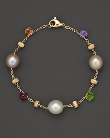 From the Paradise Collection: a bracelet of multi-colored semi precious stones and freshwater cultured pearls, designed by Marco Bicego. From the Paradise Collection: a bracelet of multi-colored semi precious stones and freshwater cultured pearls, designed by Marco Bicego.