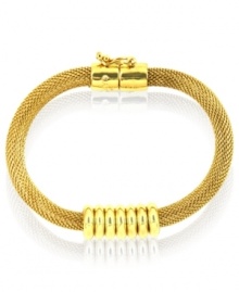 Mesh together the perfect outfit. Anne Klein's flex bracelet features a mesh pattern punctuated with a solid, shiny accent. Crafted in gold tone mixed metal. Approximate diameter: 8 inches.