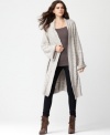 A fab layering piece, this BCBGeneration long cardigan features a thick ribbed knit and relaxed shape for on-trend style!