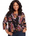 Add pizazz to your neutral bottoms with Elementz' printed plus size top, defined by a faux wrap design.