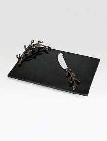 Symbolizing peace and harmony, the olive branch and its shapely leaves gracefully accent a simple slab of rich black granite and form the handle of the matching knife. From the Olive Branch CollectionGranite, oxidized bronze and stainless steel8½W X 12½L; knife 8LHand washImported Symbolizing peace and harmony, the olive branch and its shapely leaves gracefully accent a simple slab of rich black granite and form the handle of the matching knife. From the Olive Branch CollectionGranite, oxidized bronze and stainless steel8½W X 12½L; knife 8LHand washImported