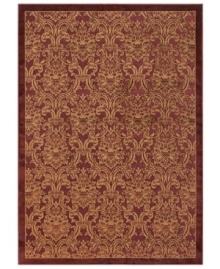 Garnet and gold make a gorgeous pair in Couristan's unbelievably plush Pave Petite Damask rug. Woven of a luxe blend of viscose, silk and chenille for one-of-a-kind texture and high-low carved effect, the rug is adorned with an elegant damask pattern in rich jewel tones that adds high style to any room.