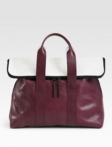 A mix of smooth leather and pebbled leather come together in an elegant and distinctive style, perfectly sized for all your essentials.Double top handles, 4 dropFold-over zip closureOne inside zip pocketFully lined16¼W X 12½H X 6¾DImported A mix of smooth leather and pebbled leather come together in an elegant and distinctive style, perfectly sized for all your essentials.Double top handles, 4 dropFold-over zip closureOne inside zip pocketFully lined16¼W X 12½H X 6¾DImported