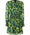 With a bold psychedelic print and a retro-inspired print, this Anna Sui mini-frock adds vibrant style for both day and night - Round neck with gathering at bust, long sleeves with shirred cuffs, shirred waist, full skirt, all-over print, concealed back zip closure - Wear with platform pumps and a statement clutch