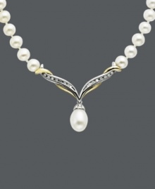Accent your neckline with the perfect sparkling sophistication. This v-shaped necklace combines cultured freshwater pearls (5-9mm) and sparkling diamond accents. Set in sterling silver and 14k gold. Approximate length: 17 inches. Approximate pendant drop: 1/2 inch. Accent your neckline with the perfect sparkling sophistication. This v-shaped necklace combines cultured freshwater pearls (5-9mm) and sparkling diamond accents. Set in sterling silver and 14k gold. Approximate length: 17 inches. Approximate pendant drop: 1/2 inch.