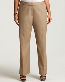 Rendered in relaxed cotton, these Tahari Woman trousers boast a clean, streamlined silhouette. Rendered in relaxed cotton, these Tahari Woman trousers boast a clean, streamlined silhouette.