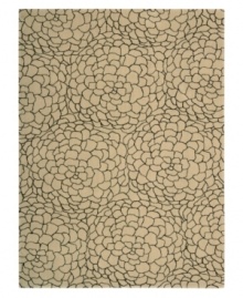 Silhouettes of swelling blossoms give this light-toned modern rug a striking character, woven from the highest quality New Zealand wool yarns. Offering an exceptionally dense and subtle texture, the Camilla presents a distinctive, abstract floral design in ivory and black colorways. Silhouettes of swelling blossoms give this light-toned modern rug a striking character, woven from the highest quality New Zealand wool yarns. Offering an exceptionally dense and subtle texture, the Camilla presents a distinctive, abstract floral design in ivory and black colorways.