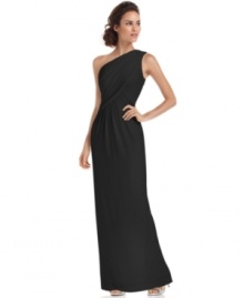 Calvin Klein's evening gown features minimal styling to let your own silhouette take center stage. A one-shoulder look and subtle gathered details at the bodice emphasize this stunning look. Calvin Klein's evening gown features minimal styling to let your own silhouette take center stage. A one-shoulder look and subtle gathered details at the bodice emphasize this stunning look.