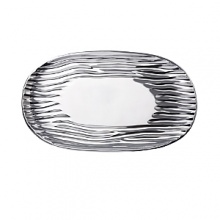 Organically molded under fire, this handmade platter exudes metal artistry with a New York edge. Organically molded under fire, this handmade platter exudes metal artistry with a New York edge.