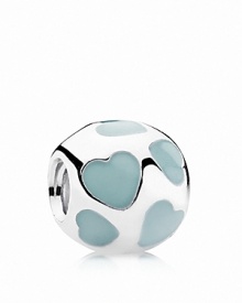 Sterling silver serves as polished backdrop to sweet heart motifs in light blue enamel. Charm by PANDORA.