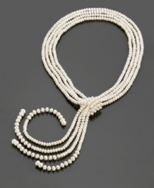 A retro glam look with the easy elegance of pearls. Four strands of cultured freshwater pearls are complemented by sterling silver beads. Necklace measures 28 inches. A retro glam look with the easy elegance of pearls. Four strands of cultured freshwater pearls are complemented by sterling silver beads. Necklace measures 28 inches.