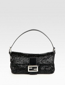 A sparkling style encrusted in baguette beads with luxurious leather trim and signature hardware.Adjustable shoulder strap, 5-8 dropSnap button flap closureOne inside zip pocketOne inside open pocketOne mirrorSatin lining9½W X 5½H X 2DMade in Italy A sparkling style encrusted in baguette beads with luxurious leather trim and signature hardware.Adjustable shoulder strap, 5-8 dropSnap button flap closureOne inside zip pocketOne inside open pocketOne mirrorSatin lining9½W X 5½H X 2DMade in Italy