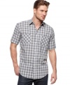 Prepare yourself. You'll get plenty of attention everywhere you go in this classic and stylish plaid shirt from Club Room.