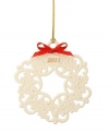 Make it a Christmas to remember with Lenox. A wreath of fine porcelain, this annual ornament is dated for the 2011 holiday season and accented with a festive red bow and gold thread.   Qualifies for Rebate