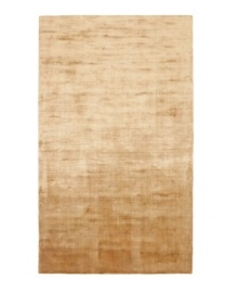 Presenting a rich, classic gold in soft viscose, the Beckett area rug from Lauren Ralph Lauren offers a chic ground ripe for enhancing any modern setting. Durable enough to withstand heavy indoor traffic, yet luxuriously soft underfoot. Presenting a rich, classic gold in soft viscose, the Beckett area rug from Lauren Ralph Lauren offers a chic ground ripe for enhancing any modern setting. Durable enough to withstand heavy indoor traffic, yet luxuriously soft underfoot.