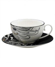 Bold florals inspired by 19th century Japanese textiles spring from the Chrysanthemum teacup of this set of striking, graphic and stylish dinnerware. The dishes feature a bouquet of cream, charcoal and gold on everyday fine china that offers the cool, modern look and unparalleled durability of Denby. Bold florals inspired by 19th century Japanese textiles spring from the Chrysanthemum teacup of this set of striking, graphic and stylish dinnerware. The dishes feature a bouquet of cream, charcoal and gold on everyday fine china that offers the cool, modern look and unparalleled durability of Denby.